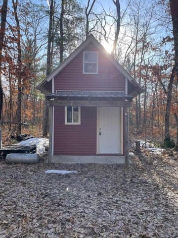 21210 W 12 Mile Road, Irons, MI 49644
