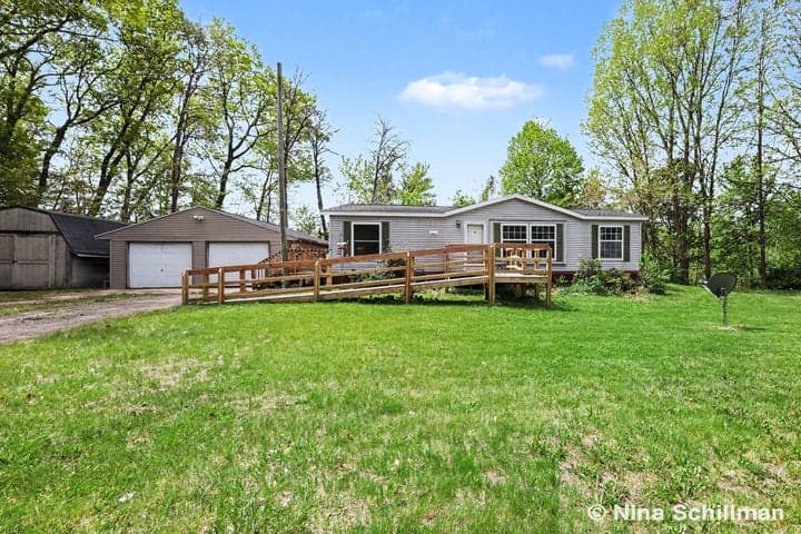 12150 Woodland Park Drive NE, Belding, MI 48809