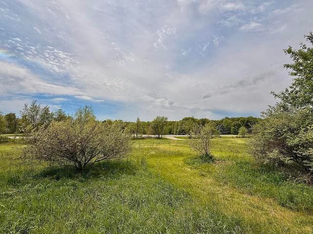 8673 Cannonsburg Road NE, Ada, MI 49301