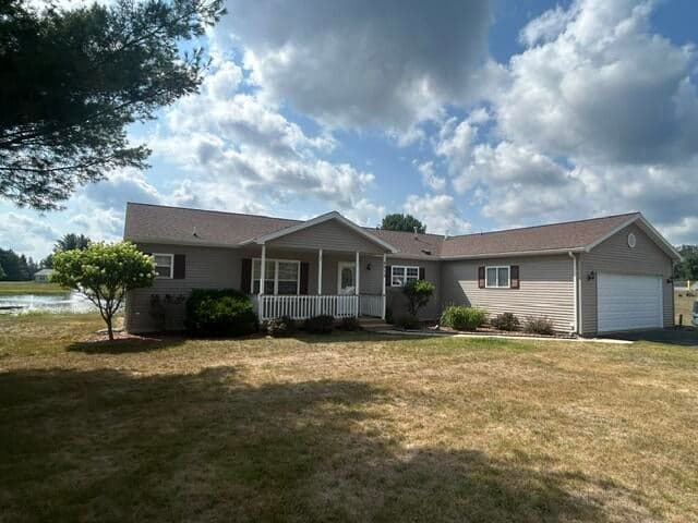 7712 Sunset Shores Drive, Canadian Lakes, MI 49346